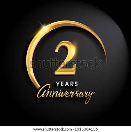 2 years anniversary celebration. Anniversary logo with ring and elegance golden color isolated on black background, vector design for celebration, invitation card, and greeting card