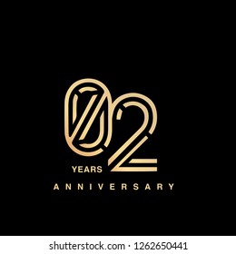 2 years anniversary celebration logotype. anniversary logo with golden and silver color isolated on black background, vector design for celebration, invitation card, and greeting card - Vector