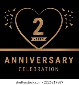 2 years anniversary celebration logotype. anniversary logo with golden color isolated on black background, vector design for celebration, invitation card, and greeting card. Eps10 Vector Illustration