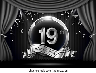 2 years anniversary celebration. with silver ribbon. Curtain background and light shine.