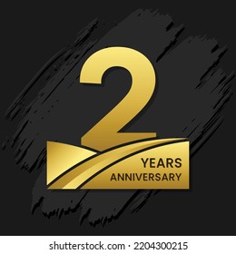 2 years anniversary celebration, anniversary celebration template design with gold color isolated on black brush background. vector template illustration