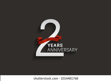 2 years anniversary design with silver color and red ribbon isolated on black background for celebration event