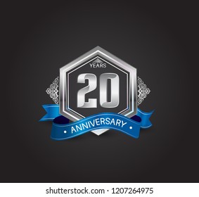 20 years anniversary logotype design with blue ribbon, silver hexagon, and ornament isolated on dark background. Vector template for celebration company event, greeting card, and invitation card