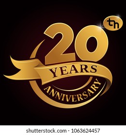 20 years golden anniversary logo celebration with golden ring and ribbon.