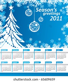 2011 Kalender mit blauem Hintergrund, Weihnachtsbaum, Bälle und Schneeflocken