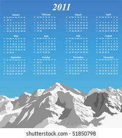2011 calendar and snow capped mountain range