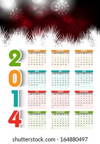 2014 year calendar with colorful text on shiny brown background. 