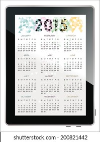 2015 calendar on the screen of tablet computer