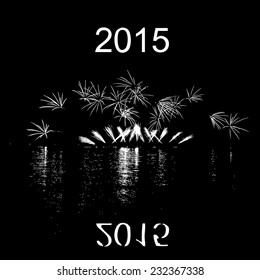 2015 with fireworks with reflection on lake