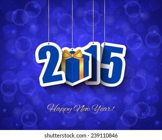 2015 New year background with gift box tag, bokeh light and snowflakes