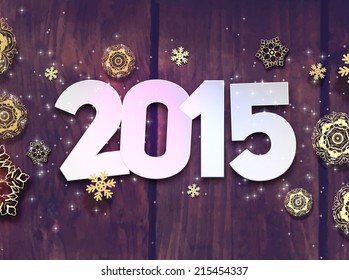 2015 Origami Happy New Year Greeting Card. Wood Background. Paper Snowflakes.