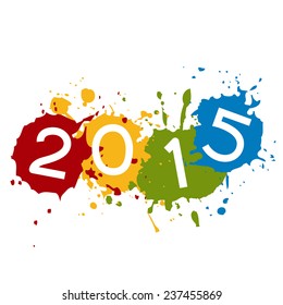 Texto de 2015 colocado en salpicaduras de tinta coloridas