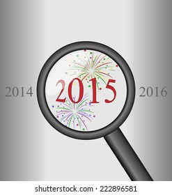 2015 zoomed on magnifier on gray background