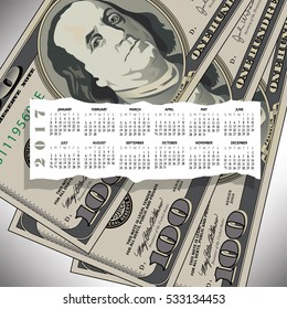 A 2017 calendar with a 100 dollar bill design