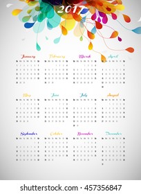 2017 calendar with abstract background with colorful leafs.