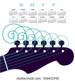 A 2017 calendar with a guitar with curly strings