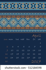 2017 Calendar planner with ethnic cross-stitch ornament Week starts on Sunday on dark blue background Vector illustration. From collection of Balto-Slavic ornaments