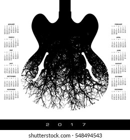 A 2017 calendar with a stunning image of a guitar and tree
