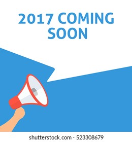 2017 COMING SOON Announcement. Hand Holding Megaphone With Speech Bubble. Flat Illustration