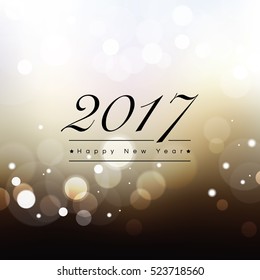 2017 Happy New Year text on abstract bokeh background