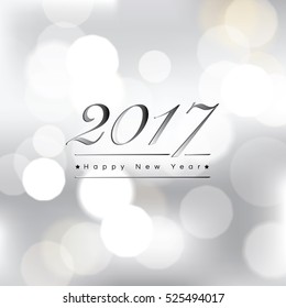 2017 Happy New Year text on abstract bokeh white gray background