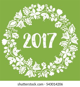 2017 New Year white vector wreath on greenery green background