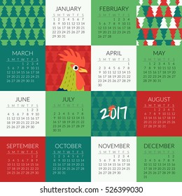 2017 wall calendar with rooster - symbol of Chinese New Year.