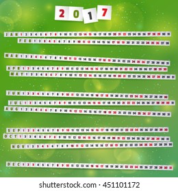 2017 Year Calendar with paper strips on joyful green background.
Smartly grouped and layered. Used font: Passion One - SIL Open Font License v1.10.