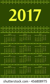 2017 year calendar template with decorative calligraphic dividers, green and yellow colors.