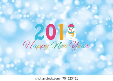 2018 Christmas card with a snowman on the background of nature and fir branches