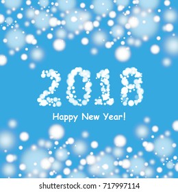 2018 Christmas card with a snowman on the background of nature and fir branches