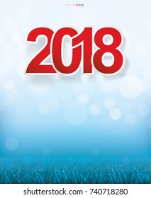 2018 Happy New Year on blue background of grass field with light blurred bokeh. Vector abstract background.