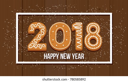 2018 New Year background made of ginger cookies on wooden background.