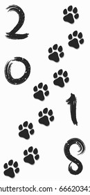 2018 year of the dog. Figures in the grunge style. Traces of a dog in black on a white background. Soft shadow. Vector illustration. EPS 10