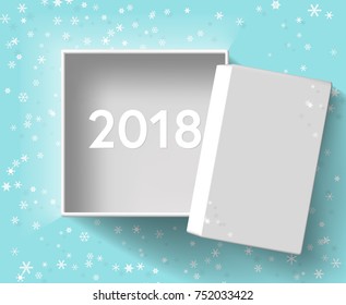 2018 year in white open box over blue background with snow flake