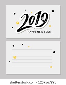 2019 hand written lettering with golden Christmas stars on a black background. Happy New Year card design.