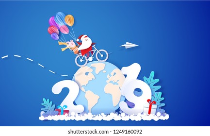 2019 New Year card design. Santa Claus and funny pig riding a bike over globe Earth on blue background. Vector paper cut art illustration for promotion banners, headers, posters, stickers