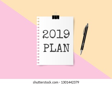 2019 PLAN text on white note paper with pen on yellow and pink paper background. Vector illustration