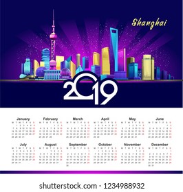 2019 vertical calendar with the image of the night neon of the Chinese city of Shanghai in English