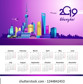 2019 vertical calendar with the image of the night neon of the Chinese city of Shanghai in English