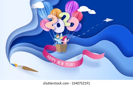 2020 New Year design card with kids in basket of air balloons flying on blue sky background with brush. Vector paper art illustration. Paper cut and craft style.