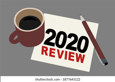2020 year review text on a napkin with a cup of coffee, end of year business concept