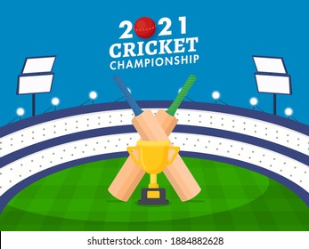 2021 Cricket Championship Concept With Crossed Bats And Trophy Cup On Stadium View Background.