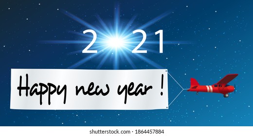 2021 greeting card showing a red airplane pulling a white banner to wish the happy new year, in front of a starry sky.