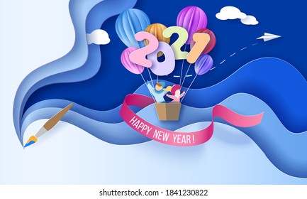 2021 New Year design card with kids in basket of air balloons flying on blue sky background with brush. Vector paper art illustration. Paper cut and craft style.