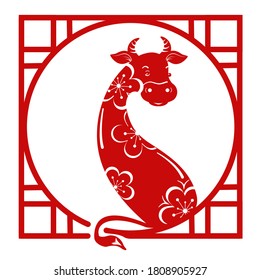 2021. New Year 2021. Symbol Ox of the Chinese New Year in a traditional frame made of red paper. Year of the bull with floral ornament.