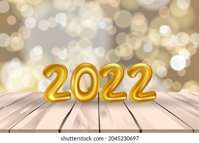 2022 balloon on wall for new year party decorate. Realistic 2022 gold balloon on wooden deck with sparkle background. Vector illustration of new year greeting card with 2022 number 