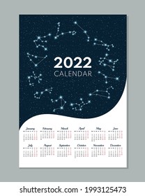 2022 calendar. Calendar concept design with constellation of the zodiac. Week starts on Monday. Vector illustration. 