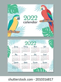 2022 calendar template. Calendar concept design with parrot. Week starts on Monday. 