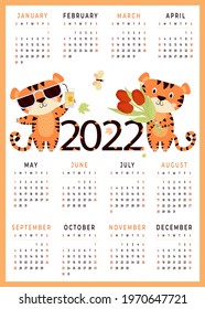 2022. Childrens calendar 2022 with cute animals. Tiger symbol of the new year 2022. Vector illustration. 12 months calendar vertical template. Stationery, ograiner and monthly planner